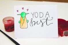 a card with the words yoda chest next to a jar of jam and a heart