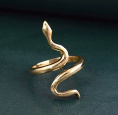 "Gold Snake Ring, Handmade Ring, Brass Ring, Serpent Ring, Dainty Ring, Snake Ring, Rings For Women, Brass Snake Ring, Snake Jewelry ❥ Customers satisfaction is our biggest priority, please contact us with any questions/queries for future or existing orders, and we will do our best to make sure you are happy with your order. ❥Please make sure to add the correct address during check out. You can return your purchased item within 15 days after successful delivery. We offer a 100% \"Money Back Guar Unique Snake-shaped Anniversary Rings, Unique Snake-shaped Ring For Anniversary, Unique Snake Shape Ring As Gift, Unique Snake Shape Rings For Anniversary, Brass Snake Ring Open Design For Gift, Brass Snake Ring Open Shape Gift, Brass Open Snake Ring Gift, Handmade Adjustable Snake Shape Rings, Halloween Ring