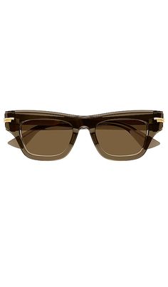 Find BOTTEGA VENETA Original Rectangular Sunglasses In Brown on Editorialist. Bottega Veneta Original Rectangular Sunglasses in Brown. Bottega Veneta Original Rectangular Sunglasses in Brown. Acetate frames. Made in Japan. Lens measures approx 51mm. Bridge measures approx 19mm. Arm measures approx 145mm. BOTR-WA98. BV1122S-006. Bottega Veneta - inspiring individuality with innovative new modes of craftsmanship since 1966. Under the direction of Daniel Lee, creativity lies at the heart of their d Elegant Brown Rectangular Sunglasses, Luxury Rectangular Glass Sunglasses, Designer Rectangular Glass Sunglasses, Transparent Sunglasses, Italian Culture, Rectangular Sunglasses, Bottega Veneta, Made In Japan, Women Men