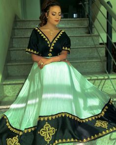 Modern Habesha Dress Handwoven Habesha Kemis Beautiful Habesha Libs Eritrean Dress ሀበሻ ቀሚስ ሀበሻ ልብስ Luxury Festive Ceremonial Habesha Kemis, Elegant V-neck Traditional Wear With Pallu, Elegant Ceremonial Dress With Pallu, Elegant Ceremonial Dresses For Navratri, Traditional Fitted V-neck Dress, Bollywood Dress With Traditional Patterns For Ceremonies, Navratri Dress With Traditional Patterns And Drape, Traditional Dresses For Navratri With Traditional Patterns, Navratri Traditional Drape Maxi Dress