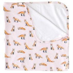 a blanket with foxes printed on it