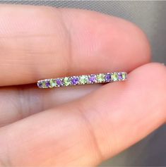 "Alternating HALF Eternity Band with Amethyst and Peridot 2mm Pave Stacking Band with Alternating Peridots and Amethysts August February Birthstone Ring Peridot for AUGUST Amethyst for FEBRUARY MaterialSolid Gold (14K &18K) or Platinum 950 FinishingHigh Polished/ Shiny PlatingRhodium/ Platinum Family (Only if white gold selected) FitComfort Fit/ Rounded Interior Width2mm Height2mm SettingU Micro Pave Set (Reminds the letter \"U\" from sides) StonesNatural Amethyst and Peridot Cut & ShapeRound, D Peridot Multi-stone Rings For May Birthstone, Anniversary Multi-stone Peridot Gemstones, Green Amethyst Promise Ring With Accent Stones, Green Amethyst Ring With Accent Stones For Promise, Green Amethyst Rings In Fine Jewelry Style, Green Gemstone Eternity Band Fine Jewelry, Round Peridot Gemstones With Accent Stones, Green Amethyst Birthstone Ring In Fine Jewelry Style, Green Amethyst Ring With Prong Setting