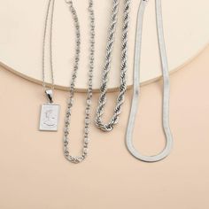 DescriptionMulti-Layer Gold Silver Tone Embossed Rectangle Charm Pendant Rope Chain Choker Necklace SetProduct DetailsColors: Gold/SilverSize: 11" + 3.9" extPendant: 0.8''Weight: 1.17 oz/setMaterial: Environmental alloy. IronStyle: Cool statement fashion metal chain pendant necklaceOccasion: Birthdays gift. Graduation gift. Christmas gift. Valentines gift. Halloween gift. Mother's Day gift. Wedding gift. Christmas gift etcâœ?Free Standard Shipping when order reach $35 (NOT including the shipping fee)Any type of art can be kept alive only when it can breathe on its own!Happy Shopping :-) Trendy Silver Square Jewelry, Silver Chain Necklace With Rectangular Pendant, Silver Rectangular Pendant Clavicle Chain Necklace, Everyday Rectangular Metal Necklace, Square Silver Metal Necklace, Silver Square Metal Necklace, Trendy Silver Rectangular Necklaces, Trendy Silver Rectangular Necklace, Silver Chunky Chain Necklace Rectangular