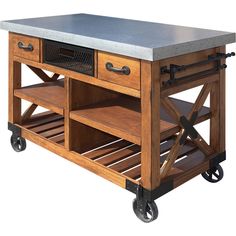 a kitchen island with two drawers and wheels on the bottom shelf is made out of wood