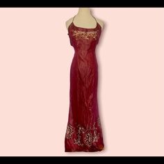 [Nicole Miller] Burgundy Beaded Silk Lined Gown Sz: 12 Nwt! 53% Viscose/32% Metal/ 15% Silk. Part Of The Millennium Collection. Length: 54”. Cutout Back. Halter Style. Zipper Closure. Red Embellished Fitted Maxi Dress, Fitted Embellished Red Maxi Dress, Fitted Red Embellished Maxi Dress, Fitted Holiday Gown For Festive Occasion, Fitted Holiday Festive Gown, Festive Floor-length Evening Dress For Holidays, Festive Holiday Floor-length Evening Dress, Embellished Red Maxi Dress, Holiday Festive Maxi Length Gown