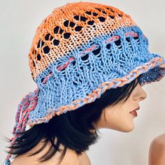 I Designed And Hand Knitted This Cotton Brim Hat, Beanie, Cap. Ombr Coral / Orange And Blue In Lace And Solid Combination Style. Bottom Of The Hat Has A Braided Tie Going Through That Allows You To Adjust Fit As Desired. Great Spring & Summer Trendy Cotton Slouch Hat! Designed And Hand Knitted In California, Usa. See All Of My Original Designs Four Seasons Trendy Quality Hand Knits Listed Under “ Hand Knits 2 Love” In My Boutique: Poshmark.Com/Closet/Soheyla Adjustable Bohemian Crochet Hat In Blue, Blue Bohemian Crochet Hat Adjustable, Adjustable Blue Bohemian Crochet Hat, Blue Adjustable Bohemian Crochet Hat, Blue Adjustable Crochet Hat For Festivals, Adjustable Blue Crochet Hat For Festival, Blue Hand Knitted Hats For Spring, Blue Knitted Hat For Spring, Blue One-size Spring Crochet Hat