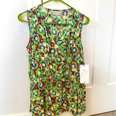 Blouse Style Fabric Tank Top By Cabi. New With Tags. Size S. Longer Style Fit With Elastic Around The Waist To Frame The Waist. Colors Are Lime Green, Red, Teal, Purple And Beige. Green V-neck Top With Vibrant Print, Multicolor Sleeveless Top For Spring, Vibrant Print Sleeveless Top For Day Out, Sleeveless Tops With Vibrant Print For Day Out, Green Sleeveless Blouse For Spring, Multicolor Sleeveless Spring Blouse, Multicolor Sleeveless Casual Blouse, Sleeveless Multicolor Spring Blouse, Spring Sleeveless Tops With Vibrant Print