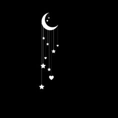 the moon and stars are hanging in the night sky with white lights on it's strings