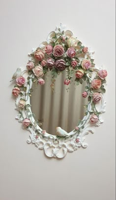 a mirror that has some flowers on it