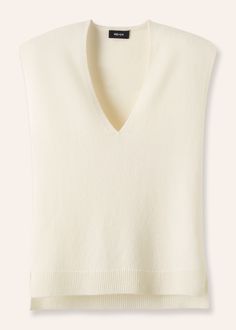 Soft, lightweight cashmere and warm merino wool grant this Cream Merino Cashmere Relaxed V Neck Vest by ME+EM easy adaptability and transeasonal versatility layered over shirting or camis throughout the year. Ground the ethereal cream colourway with dark-