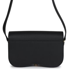 This Della Cavalleria Elan is of Black Epsom leather with gold hardware, features tonal stitching, rectangular shaped bag with curved base, gold half-bit clasp closure, a flat leather buckle shoulder/crossbody strap with one exterior back pocket. The interior is lined in Black swift leather and has one interior slip pocket on back wall.Collection: WOrigin: FranceCondition: New and never worn (plastic on hardware)Accompanied by: Hermes box, Hermes dustbag, felt, and carebookMeasurements: 9" width x 6" height x 2.5" depth; 19" strap drop Chic Business Saddle Bag With Gold-tone Hardware, Elegant Workwear Saddle Bag With Turn-lock Closure, Elegant Workwear Saddle Bag With Metal Hardware, Classic Black Saddle Bag With Palladium Hardware, Modern Formal Saddle Bag With Gold-tone Hardware, Timeless Black Saddle Bag For Evening, Classic Rectangular Saddle Bag With Metal Hardware, Classic Saddle Bag With Magnetic Closure For Formal Use, Timeless Flap Bag With Gold-tone Hardware For Work