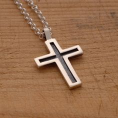 "This handmade oxidized sterling silver cross pendant features a unisex design that is modern, yet elegant, combining just the right amount of style and grace. It is an ideal jewelry option for either a man or woman. Suspended from a sterling silver chain or a black leather cord 48cm long with silver clasp and endings, it is the perfect way to share your message of faith with those around you. It also makes a modern fashion statement that makes an exceptional gift for anyone on your gift list. Y Gift Sterling Silver Cross Necklace With Oxidized Finish, Sterling Silver Oxidized Crucifix Necklace, Oxidized Sterling Silver Cross Pendant Necklace, Sterling Silver Oxidized Cross Necklace, Silver Casting, Silver Cross Necklace, Sterling Silver Cross Pendant, Silver Cross Pendant, Christian Jewelry