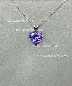 "A beautiful purple shaded necklace that is sure to get lots of attention. Makes a great gift, arrives in a wrapped gift box. Chain Size : 18 \" (45.7 cm) including the clasp Pendant Size : 1.2 cm (5 Carat) Main Stone Color : Purple Main Stone: Purple Sapphire Main Stone Shape : Heart Cut Metal : Real Solid 925 Sterling Silver Hallmark : 925 Stones Setting : Prong Finish : Fine Polished Guaranteed High Quality Purple Heart Sapphire Necklace 5 Carat Purple Sapphire Bridal Necklace 925 Sterling Si Purple Heart Cut Sterling Silver Necklace, Purple Heart-cut Sterling Silver Necklace, Sterling Silver Purple Heart Pendant Necklace, Purple Sterling Silver Heart Pendant Necklace, Purple Sterling Silver Heart Cut Necklace, Purple Sterling Silver Necklaces For Valentine's Day, Purple Cubic Zirconia Jewelry For Valentine's Day, Purple Heart Necklace With Heart Charm As A Gift, Purple Round Necklace For Valentine's Day