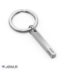 a metal keychain with a name tag attached to it's side on a white background