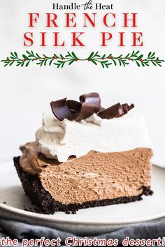 a piece of chocolate cheesecake with whipped cream on top is sitting on a white plate