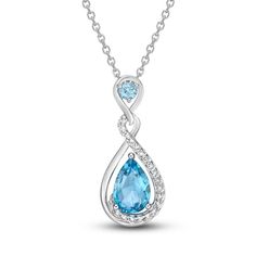 Keep life colorful with the happy hue and standout style of this gemstone necklace. An enchanting pear-shaped Swiss Blue topaz is perfectly perched amidst the endearing infinity-inspired silhouette. A round-cut Swiss Blue topaz tops the setting while a radiant ribbon of sparkling round-cut white topaz lends extra shimmer and shine. Styled in sterling silver, the pendant suspends from an 18-inch cable chain that secures with a lobster clasp. Prom 2k24, White Topaz Necklace, Pretty Jewelry Necklaces, Pinterest Ideas, Shimmer And Shine, Topaz Necklace, Pretty Jewelry, White Necklace, Swiss Blue Topaz