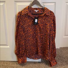 Brand New Xl Fashion Nova Navy And Bright Orange Button Up Blouse! So Cute Just Too Big For Me. Chic Orange Collared Blouse, Chic Orange Long Sleeve Blouse, Orange Long Sleeve Blouse For Work, Orange Collared Blouse For Fall, Trendy Orange Shirt For Work, Fall Orange Blouse With Button Closure, Orange Printed Long Sleeve Blouse, Orange Button-up Blouse For Fall, Orange Tops With Button Closure For Work