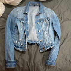 American Eagle Jean Jacket Never Worn Trendy Light Wash Fitted Outerwear, Casual Blue Cropped Jacket For Fall, Trendy Fitted Light Wash Outerwear, Fitted Light Wash Outerwear For Fall, Fitted Light Wash Long Sleeve Outerwear, American Eagle Jeans, Jean Jackets, Jean Coat, Jean Jacket