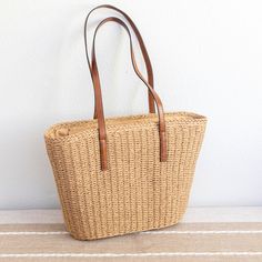 IN STOCK FAST SHIPPING FROM LOS ANGELES Large fashion straw woven tote bag perfect for all occasions. Its timeless design makes it the perfect everyday accessory, providing a fashionable and luxurious touch to any ensemble. Size: 44cm wide x 28cm tall (17in x 11in) Designer Style ID: 8498 Country Style Straw Woven Tote Bag, Vintage Vibes, Summer Bag, Everyday Shoulder Bag, Beach Bag Straw Weaving, Woven Tote Bag, Market Tote, Jute Bags, Everyday Accessories, Shoulder Purse, Large Fashion, Casual Bags, Beach Bag