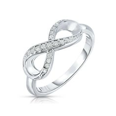 The infinity symbol represents endless love as well as forever and always. Add to your beautiful outfit with this stylish and unique Infinity ring. A sparkling sterling silver ring that's great for everyday or a night out. Crafted from .925 Sterling SilverAvailable in Sizes 5, 6, 7, 8, and 9Endlessly Sparkling Cubic Zirconia StonesSame day shipping and comes in an elegant gift box! Silver Infinity Ring, Infinity Diamond Ring, Thumb Rings Silver, Forever And Always, Luxury Jewellery, Infinity Ring, Baby Cows, Infinity Symbol, Endless Love