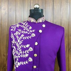 Product Description - The first and most important rule of men's style is you should feel comfortable and confident in your clothes. You will need both these attributes to pull off just about any outfit successfully. A suit that fits increases your confidence and makes you look good. Regardless of how 'classy' or expensive they might be. New Stylish handmade Decent Sherwani for men for wedding and festive occasions.  Stylish New Ethnic Sherwani for men Top Details  -  Color  - Purple Fabric  -  suiting Bottom Details - Color  -  White  Fabric - cotton Bottom Style  - Pant Note 1 :- If you want any other Color in this so please send us a message sothat we will make it according to your choice. Note 2:-  Select your size according to your chest. Note 3 :- If you want in your perfect size the Designer Bandhgala With Zari Work For Diwali, Designer Nehru Jacket With Zari Work For Diwali, Designer Churidar With Zari Work For Diwali, Designer Zari Work Churidar For Diwali, Designer Bollywood Sherwani With Dori Work, Designer Semi-stitched Bandhgala With Zari Work, Formal Purple Unstitched Suit With Dabka Work, Designer Sherwani With Zari Work For Diwali, Bollywood Style Bandhgala With Dori Work And Long Sleeves