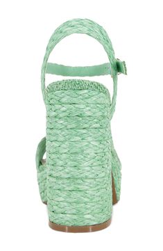 Head off to paradise in this sky-high sandal flaunting goldtone hardware and an expertly woven upper for beachy vibes. 4" heel; 1" platform Cushioned footbed Synthetic upper and lining/rubber sole Imported Spring Green Sandals With Woven Sole, Summer Platform Heels With Straw Material, Straw Platform Heels For Beach Season, Platform Heels For Summer Outings, Straw Platform Heels For The Beach, Vacation Heels With Braided Straps And Open Heel, Straw High Heel Sandals For Vacation, Summer Vacation Heels With Heel Strap, Summer Heels With Woven Sole