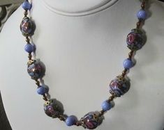 "Gorgeous, authentic Murano, vintage Venetian \"wedding cake\" glass bead handmade necklace with blue, pink, and aventurine flecked gold glass from Murano, Italy, 1970s. Beautiful blue beads of different shapes, with pink rose flowers and gold aventurine flecks threaded through the design of the large beads, alternating with smaller solid blue glass beads and gold-fill and brass spacer beads. Vintage Italian glass artistry from the 70s. A wonderful \"something blue\" for a bride, a perfect weddi Vintage Czech Glass Oval Beaded Necklace, Vintage Czech Glass Beaded Necklaces With Polished Beads, Vintage Czech Glass Beaded Necklace With Round Beads, Vintage Style Czech Glass Beaded Necklace, Vintage Czech Glass Beaded Necklaces With Round Beads, Vintage Czech Glass Necklace With Polished Beads, Vintage Czech Glass Polished Beads Necklace, Vintage Czech Glass Jewelry With Large Beads, Vintage Jewelry With Large Czech Glass Beads