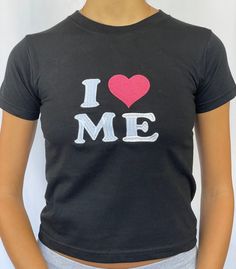 "I ♥ ME baby tee 100% cotton available in sizes xs - xl - see photo 3 for sizing Model is wearing size S and is a 6/8 - For reference, model is 5'5 with 31\" bust and 26\" waist baby tee with i love / heart me embroidery" Fitted Cotton Cropped T-shirt With Graphic Print, Fitted Casual T-shirt With Heart Graphic, Cute Fitted T-shirt With Heart Graphic, Y2k Cotton Cropped T-shirt With Letter Print, Fitted Graphic Cropped T-shirt With Slogan, Stretch Short Sleeve Tops With Heart Graphic, Stretch Top With Heart Graphic And Short Sleeves, Short Sleeve Top With Heart Graphic, Cute Stretch Cotton T-shirt