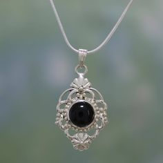 Fashioned of silver an ornate pendant hosts baroque blossoms. They surround a hemisphere of polished black onyx. Bhavesh presents this beautiful design with a smooth silver chain to complete the necklace. .925 Sterling silver Onyx Jewelry Necklace, Slytherin Jewelry, Etsy Jewellery, Soldered Jewelry, Elven Jewelry, Edgy Jewelry, Onyx Pendant, Black Onyx Necklace, Gothic Clothes