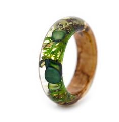 Аbsolutely natural ring by VyTvir are made with great love.  Materials: Malachite, Moss, birch tree and lichen , 24K Gold. Malachite is considered a symbol of wealth and prosperity, is an unusually beautiful stone that fulfills wishes. Birch is a tree symbolizing spring and resurrection, the month of April. Custom orders are welcome. Every item comes in a beautiful, individual original box ready for gift giving. Natural VyTvir rings are made with great love for nature If you have any questions p Green Flower Ring Gift, Green Promise Rings With Nature-inspired Style, Green Nature-inspired Promise Rings, Green Crystal Ring Gift, Nature-inspired Green Jewelry For Promise, Handmade Green Flower Ring, Green Crystal Round Band Ring As Gift, Handmade Green Promise Ring, Unique Green Jewelry For Promise