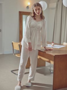 Editor's NotesBALCONY's Belleza pajama set. Pajama set with a soft texture and smocking detail. The pajama set has lace detail that creates a romantic mood.                          - Belleza pajama set- Has smocking detail- Has lace detail- Has a soft textureMeasurements (inch)Top (M/L)- Length: 22.4/23.4 inch- Chest: 16.5/17.5 inch- Sleeve: 23/23.4 inchBottom (M/L)- Length: 37.8/38.7 inch- Rise: 12/12.4 inch- Hips: Casual Loungewear Sets With Lace Trim, Feminine Relaxed Fit Sleepwear, Long Sleeve Sleepwear With Lace Trim For Loungewear, Feminine Long Sleeve Sets For Daywear, Feminine Long Sleeve Lounging Sets, Feminine Long Sleeve Sleepwear For Loungewear, Feminine Long Sleeve Sleepwear Set, Feminine Long Sleeve Bedtime Sets, Feminine Long Sleeve Sleep Sets