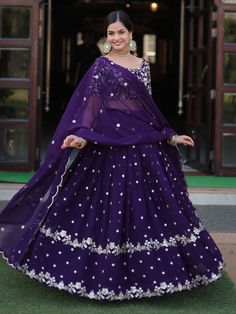 Introducing our fabulous violet embroidered georgette function wear lehenga choli, the perfect outfit for your special occasions. This stunning ensemble features a violet color georgette lehenga with heavy sequin and embroidered work, paired with a matching georgette choli adorned with heavy sequin work and multi-embroidered detailing. The look is completed with a georgette dupatta featuring sequin multi-embroidered arco cut work and designer lace work.
This outfit includes high-quality georgett Semi-stitched Purple Sharara With Resham Embroidery, Embroidered Purple Georgette Lehenga, Purple Embroidered Georgette Lehenga, Purple Georgette Sharara For Eid, Purple Floor-length Traditional Wear With Dabka Work, Festive Purple Georgette Sharara, Floor-length Purple Saree For Navratri, Purple Floor-length Saree For Navratri, Bollywood Style Designer Purple Sharara