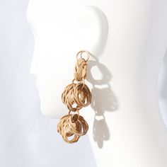 A quintessential summer statement piece, Rattan Earring interlinks loops of vintage rattan and upcycled brass to create a large, yet remarkably lightweight design. The intricate weaving and natural texture of the rattan bring a touch of earthy elegance, making these earrings perfect for both breezy beach days and sophisticated summer evenings. Embrace the effortless charm of these statement earrings and let your summer style soar. Part of our Reclaimed Vintage Series, this earring is comprised o Earthy Elegance, Vintage Rattan, Vintage Charm Bracelet, Minimal Earrings, Reclaimed Vintage, Vintage Bridal, Beach Days, Cuff Bangles, Vintage Bracelets