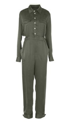 This utility jumpsuit is a chic and practical garment that combines modern style with functional design. The jumpsuit is rendered in a deep olive green colour, providing a versatile and earthy aesthetic. It features a collared neckline and a button-down front with off white buttons. The waistline is cinched with an elastic band, creating a defined silhouette that flatters the figure while maintaining comfort. The trouser, which form the lower part of the jumpsuit, are tailored with an adjustable tapered cuff that can been worn open or closed depending on your shoe choice. Designed in Hong Kong Made ethically in China Fits true to size Sand-Washed Mulberry Silk Small Batch Sustainable Finished with Internal French Seams International Certification: OEKO-TEX Standard 100  Care Guide Dry Clea Khaki Utility Jumpsuits And Rompers For Workwear, Utility Style Khaki Jumpsuit For Work, Khaki Utility Jumpsuit For Work, Green Utility Jumpsuits And Rompers For Work, Green Utility Jumpsuit For Workwear, Green Utility Style Jumpsuit For Work, Deep Olive Green, Animal Print Party, Earthy Aesthetic