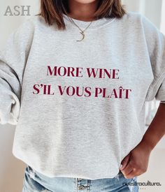 More wine s'il vous plaît sweatshirt, more wine please, french clothing, french sayings, wine hoodie, wine shirt, mom shirt, funny wine mom 🪄 PRODUCTION: 2-3 DAYS  🚚 SHIPPING: 2-5 DAYS (USUALLY 3 DAYS) Hello, and welcome to the Nuestra Cultura store! Our goal is to make high-quality products that make you smile, 100% guaranteed! ❤️ Made with high-quality printing, made con amor for you. ❤️ The perfect gift for your special person. ❤️ 🌟 A classic fit sweater that's made with air-jet spun yarn Wine Tshirts, Euro Chic, Wine Outfit, Wine Mom, French Outfit, Pull Oversize, Wine Shirts, French Quotes, Wine Humor