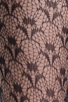 Patterned and designed like royalty! Featuring saint-like symbols designed and printed throughout the fabric; these sheer tights will dress up any outfit you have planned! Jacquard print French emblem design Sheer fishnet design Soft, comfortable, and durable One Size Height: 5'-5'1 // Weight: 100-175lbs Composition: 88% Nylon 12% Spandex Care: Hand wash in warm water using mild soap. Do not bleach. Drip dry in shade. Do not tumble dry. Do not iron. Elegant Fishnet Mesh Hosiery, Black Fishnet Mesh Hosiery, Black Lace Fitted Hosiery, Tight Black Fishnet Tights, Black Tight Fishnet Tights, Black Lace Tights For Party, Black Fishnet Mesh Tights, Black Lace Stretch Tights, Sheer Lace Stretch Tights