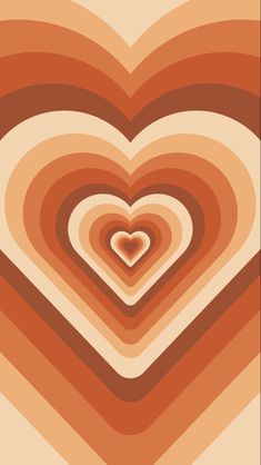 an image of a heart shaped object in the middle of a photo with brown and orange colors