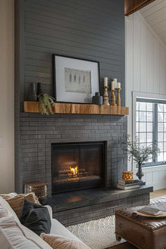 40 Elegant Gray Brick Fireplace Ideas for a Contemporary Home Dark Gray Painted Fireplace Brick, Charcoal Colored Fireplace, Painted Gray Fireplace, Fireplace Ideas Contemporary, Brick Paneling Fireplace, Dark Gray Brick Fireplace Paint Colors, Wood Mantle Brick Fireplace, Electric Fireplace Ideas Farmhouse, Fireplace With Wrap Around Hearth