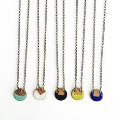 Enamel and gold finish on small copper circles. Choose between 5 colors (aqua, black, white, chartreuse green, and cobalt blue) The chain is brass , hangs at 16 inches, and the circle pendant is 1/2 inch around. A layer of lacquer seals the surface for wear.  Please note, the exact color and placement of the enamel and gold finish may differ slightly due to the handmade nature. The design and color will be similar. All jewelry arrives packaged in a muslin bag for safe keeping and ships in 2-5 da Half Moon Necklace, Sterling Silver Name Necklace, Crescent Necklace, Chartreuse Green, Muslin Bags, Silver Bead Necklace, Gold Name Necklace, Enamel Necklaces, Name Jewelry