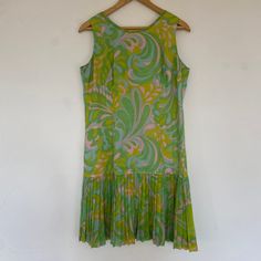 "Vintage 1960s Psychedelic Dress, 60s Drop Waist Dress, Sixties Patterned Mini Dress Medium / 12  True vintage 60s dress: groovy lime green, pink, blue & yellow pattern - bold colourful print. Above the knee, sleeveless, zip up fastening, fitted upper with drop waist & floaty pleated skirt - 1920s flapper dress inspired!  Incredibly rare 1960s handmade dress in excellent condition.  Best fits up to a UK size 12 / Medium. Please see all measurements below. Length: 38 Chest: 42\" (pit to pit: 21\")  Bicep:18\" Waist: 36\" Hip / Drop Waist: 42\"" Retro Green Dress With Vintage Print, 1950s Retro Print Spring Dress, Green Retro Dress With Retro Print, Green Retro Print Dress, Mid-century Green Summer Dress, Spring Mod Dress With Vintage Print, Green Mod Dress With Retro Print, 60s Outfit Ideas, 1960’s Dresses