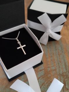 Small, Genuine .925 Italian Sterling Silver Cross Necklace. Sterling Silver small Cross Pendant measures 1 inch (with bail) Sterling Silver .08mm Cable or Box Chain, choose style & length at checkout Arrives in a Beautiful Necklace Gift Box See More Of My Shop Here: http://www.etsy.com/shop/ForeverMemoryDesigns Silver Cross Jewelry, Mens Chain Bracelet, Necklace Gift Box, Sterling Silver Cross Necklace, Simple Cross, Drop Pendant Necklace, Cross Jewelry, Sterling Silver Cross, Cross Charms