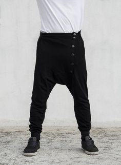 Panelled drop crotch joggers with 5 buttons offset closure & elastic waistband[] ENJOY FREE SHIPPING []> Place an order of 150€ minimum items’ value> Add coupon code VMFREESHIP at checkout> Benefit from free shipping[] EXTRA BENEFITS []> All orders above 25€ win a “Thank you” 10% discount coupon available for the next order> All orders receive special surprise gifts.[] GREEK CUSTOMERS []Buyers from Greece are advised to visit the official VOIDmode shop > (http://bit.ly/VOID Casual Bottoms With Buttons For Streetwear, Black Buttoned Bottoms For Streetwear, Baggy Tapered Leg Joggers For Streetwear, Cotton Streetwear Bottoms With Buttons, Cotton Bottoms With Buttons For Streetwear, Baggy Tapered Leg Bottoms For Streetwear, Cotton Drop Crotch Bottoms For Streetwear, Baggy Hip Hop Joggers, Baggy Bottoms With Buttons