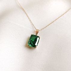 This stunning pendant is set in 14K Solid Yellow Gold with AAA Green Cubic Zirconia in classic prong setting. It is an unique gemstone pendant for nearly every occasion and is completely hassle-free jewelry. ◾ITEM DETAILS * Gem: Cubic Zirconia Green * Gem Size: 8X10mm * Gem Shape: Octagon cut * Gem Weight: 7.01 carats * Gold Purity: 14KT  * Gold Weight: 0.67 gram * Total Weight of the Pendant: 2.07 gram The Gold purity is guaranteed and it comes with authentic 14KT gold hallmark. Since my items Formal Emerald Rectangular Pendant Jewelry, Elegant May Birthstone Necklace With Rectangular Pendant, Formal Jewelry With May Birthstone Rectangular Pendant, Classic Rose Gold Emerald Jewelry, Elegant Emerald Necklace With Rectangular Pendant May Birthstone, Elegant Emerald Necklace With Rectangular Pendant For May Birthstone, Elegant Emerald Necklace With Rectangular Pendant, Elegant Rectangular Emerald Pendant Necklace As Gift, Elegant Emerald Necklace With Rectangular Pendant For Gift