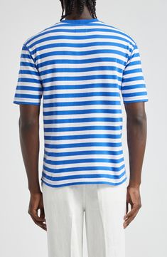 Classic stripes race across this staple cotton T-shirt that can be layered and worn year-round. 26" length (size Medium) Crewneck Short sleeves 100% cotton Machine wash, dry flat Made in Portugal Designer Clothing Summer Cotton Crew Neck T-shirt, Blue Cotton T-shirt With Contrast Stripes, Summer Cotton Tops With Horizontal Stripes, Cotton Tops With Horizontal Stripes For Summer, White Horizontal Stripe T-shirt For Summer, White T-shirt With Horizontal Stripes For Summer, Casual Cotton Top With Horizontal Stripes, Relaxed Fit Crew Neck T-shirt With Horizontal Stripes, Summer Relaxed Fit Tops With Three Stripes