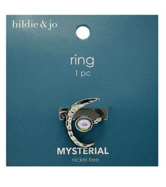 Get Spooky with the 1" Halloween Crescent Moon Stone Ring by hildie & jo Add some eerie elegance to your Halloween costume with this adjustable ring featuring a crescent moon and round stone The intricate design and attention to detail make this ring a must - have accessory for any Halloween party or event The silver color adds a touch of sophistication to your spooky style Product Details Dimensions: 1"x3/4" Material: Zinc Alloy, Glass Color: Silver Quantity: 1 piece Moon Stone Ring, Spooky Style, Halloween Jewelry, Glass Color, Joanns Fabric And Crafts, Moon Stone, Intricate Design, Adjustable Ring, Stone Ring