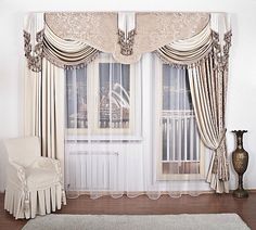 an elegant living room with white furniture and curtains