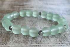 This beautiful Green Glass beaded bracelet with silver hematite accents is a perfect go-to everyday bracelet!  This would make an excellent gift for a loved one! *Sizing* If you are unsure what size to purchase, an average female bracelet size is 7 inches. Please measure your exact wrist size for the best fit, and I will make the adjustments. Average Sizes (wrist measurements): - Young Teen --> 5.5 inches - Petite Adult --> 6 inches - Average Adult --> 6.5 inches - Average Mens --> 7.5 inches This is just a guide; please measure your wrist for accuracy. Thanks for stopping by Oasis Design by Liz! Find great complementary bracelets in my shop --> https://www.etsy.com/shop/OasisDesignByLiz Nickel-free Modern Beaded Bracelets As Gift, Modern Nickel-free Beaded Bracelets For Gifts, Modern Stretch Bracelet With Round Beads As Gift, Oasis Design, Glass Beaded Bracelet, Everyday Bracelet, Hematite Bracelet, Glass Beaded Bracelets, Bracelets Handmade Beaded