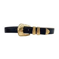 Streets Ahead Violet Belt. Home Violet Belt - Black Italian Leather Belt With Detailed Vintage Gold Buckle | Streets Ahead Add a vintage touch to your look with this western-inspired belt featured in black Italian leather, an eye-catching gold buckle, engraved details, and a metal tip. Details: Strap Width 1.5" Buckle Height 2.75" Length 3" Feather Edge Genuine Italian Leather Can be worn as a hip or waist belt. Sizing will differ based on where the belt is worn, please refer to the size guide t Luxury Leather Belt Buckles With Gold-tone Logo, Black Gold Belt, Western Gold Leather Belt, Western Gold Belt With Antique Buckle, Gold Western Belt For Western-themed Events, Western Style Gold Belts For Western-themed Events, Black Belt With Antique Buckle For Rodeo, Gold Western Belt Buckles For Formal Wear, Gold Western Belt Buckles For Formal Occasion