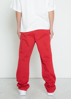 Get ready to make a statement with our Konus Men's Stretch Twill Baggy Chino Pants! Designed with a relaxed fit, these chinos offer both style and practicality. The front slash pockets provide easy access to your essentials, while the welt pockets on the back and thigh add extra storage options. You'll love the comfort and flexibility of these chinos, perfect for any occasion. Upgrade your wardrobe with our versatile and trendy chino pants. Order now and experience the ultimate combination of fa Baggy Red Cotton Sweatpants, Red Baggy Cotton Sweatpants, Red Baggy Casual Sweatpants, Red Cotton Pants With Side Pockets, Red Baggy Cotton Pants, Baggy Red Cotton Cargo Pants, Red Cotton Bottoms With Side Pockets, Red Cotton Pants For Streetwear, Red Cotton Streetwear Pants