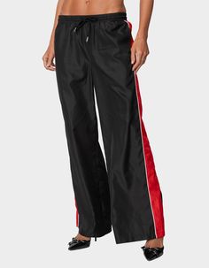 These Track Pants Offer Both Style And Comfort, Making Them Perfect For A Sporty Yet Fashionable Look. They're Ideal For Any Activity, Ensuring You Feel Comfortable And Confident Throughout Your Entire Day. Track Pants. Drawstring Waistband. Contrast Panel Design. 100% Polyester. Model Wears Size S. Model Height Is 5'9. Item Care: Machine Wash At Maximum 30ºc, Do Not Bleach, Do Not Tumble Dry, Iron At A Maximum Of 110ºc, Do Not Dry Clean. | Edikted Cameron Contrast Panel Track Pants Overalls Boys, Chino Pants Women, Wwe T Shirts, Boys Graphic Tee, Girls Graphic Tee, Casual Flat Shoes, Girls Blouse, Loose Jeans, Shoes With Jeans